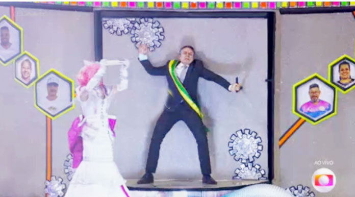Bolsonaro toma  vacina e vira  ‘jacaré’ no desfile da Rosas de Ouro. Assista ao vídeo.